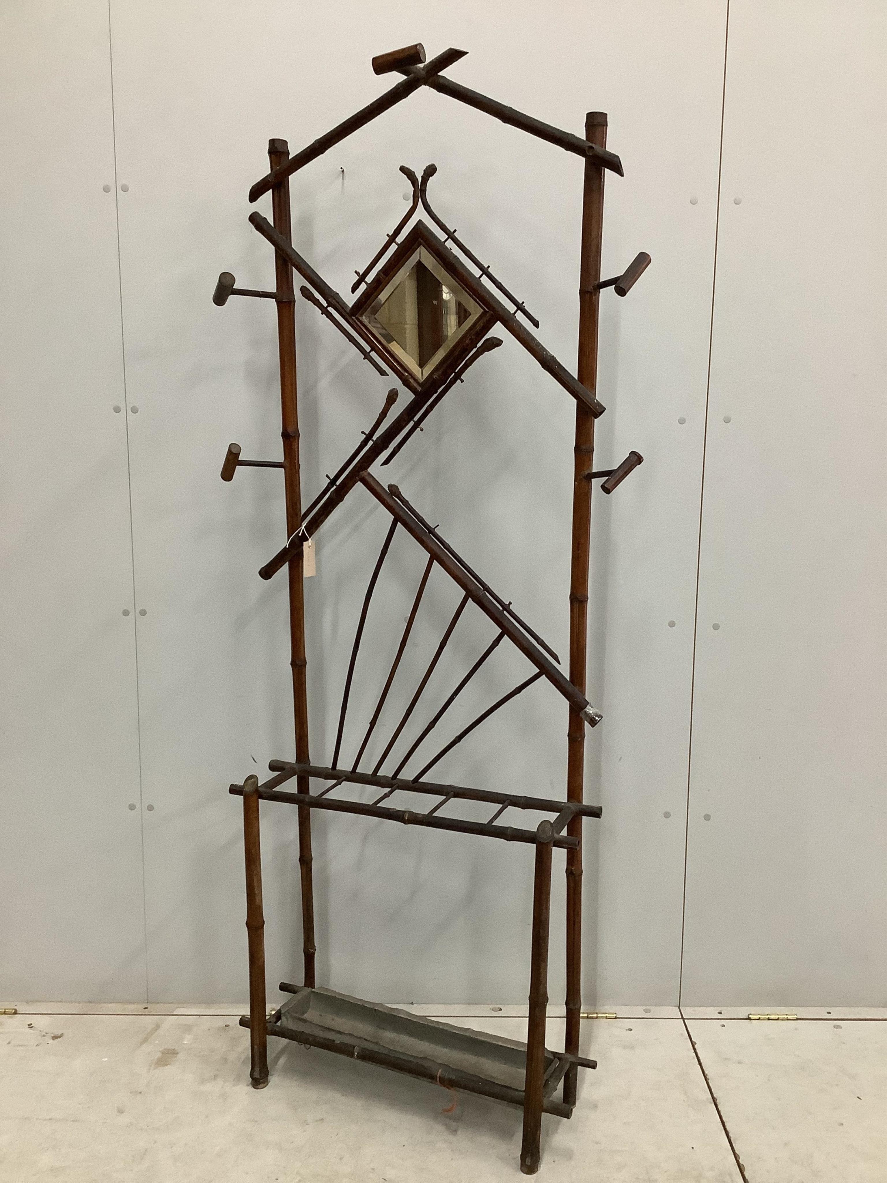 A Victorian bamboo hall stand, width 81cm, height 195cm. Condition - fair